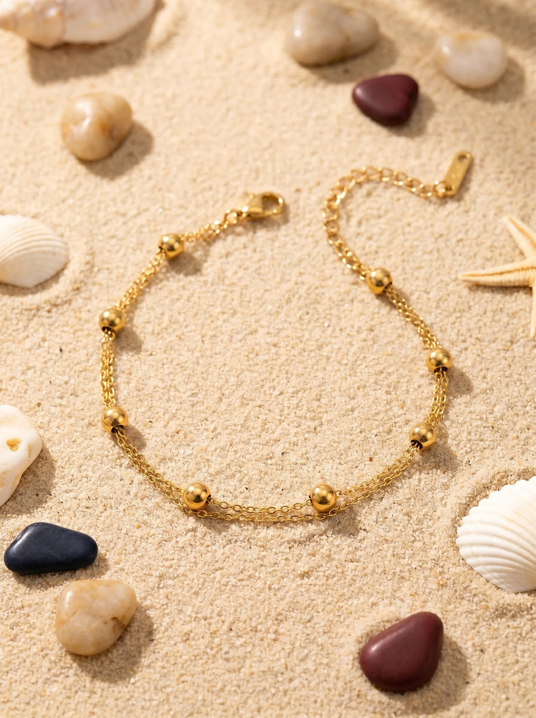 luxury anklet waterproof displayed on jewelry sandy beach environment | Oria Jewel