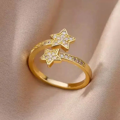 Pavé Double Star Open Ring close-up on soft beige fabric, adjustable open design with two sparkling pavé star ends and pavé stones along the band | OriaJewel