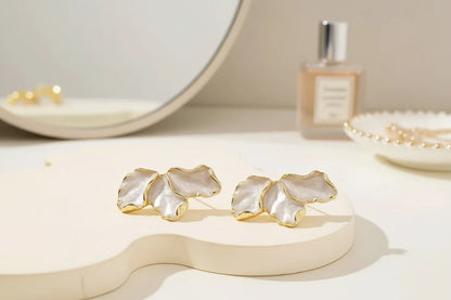 Pearl Petal Statement Stud Earrings vanity flat lay with mirror | OriaJewel
