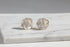 Pearl Rosette Stud Earrings on marble surface in soft daylight | OriaJewel