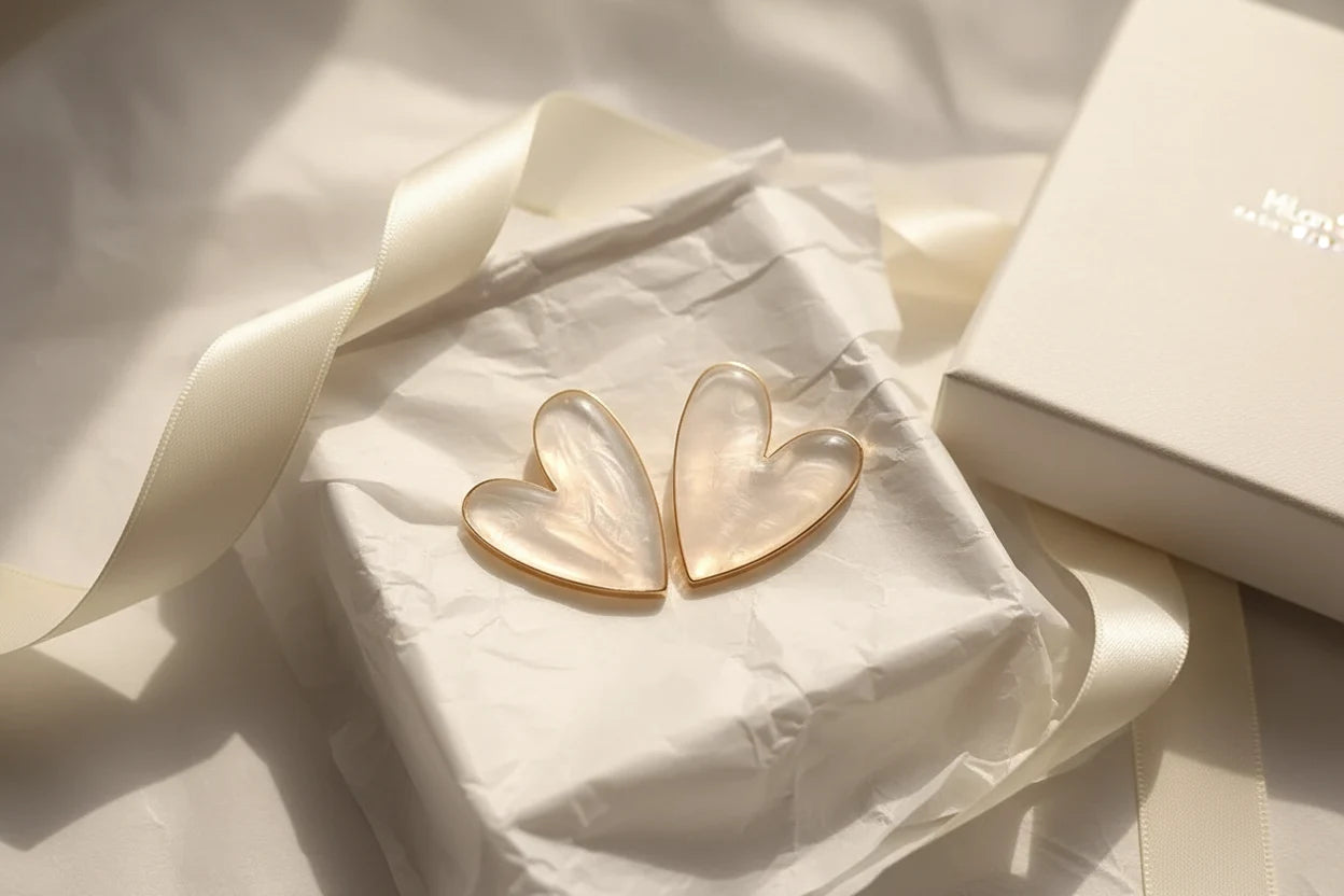 Pearl White Marble Heart Stud Earrings on gift wrap with satin ribbon and box | OriaJewel