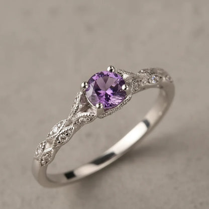 Purple Solitaire Filigree Ring close-up showing the round purple center stone in prongs and detailed silver filigree band, crisp macro detail. | OriaJewel