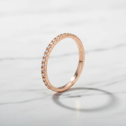 Rose Midi Ring Set rose-gold pavé band standing on white marble surface, side view highlighting sparkle and clean shadow | OriaJewel