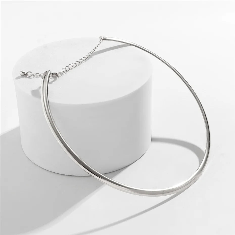 Close-up of metallic silver Vintage choker necklace on white background | Oria Jewel