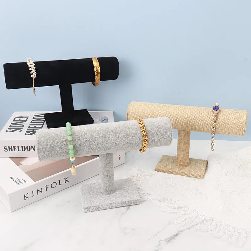 t bar bracelet holder with gold and silver bracelets displayed neatly | Oria Jewel