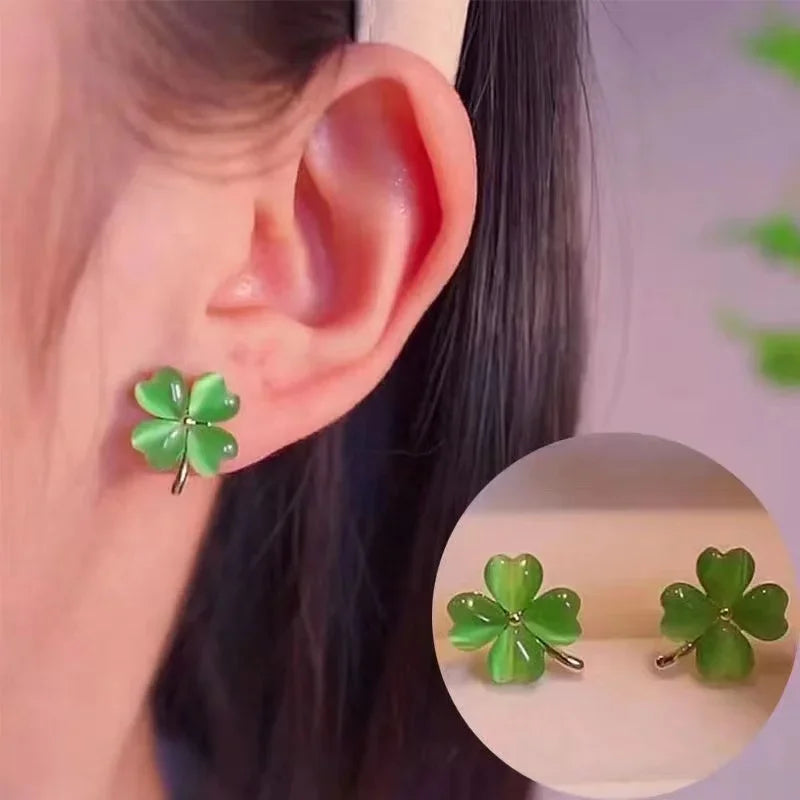 Translucent green Leaf Clover pretty studs worn on ear, pair shown | Oria Jewel