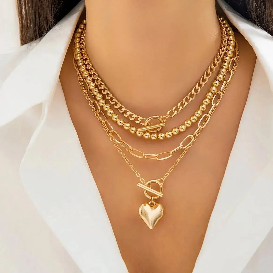 Model wearing adjustable Y2K Heart layered neckless in a casual outfit | Oria Jewel