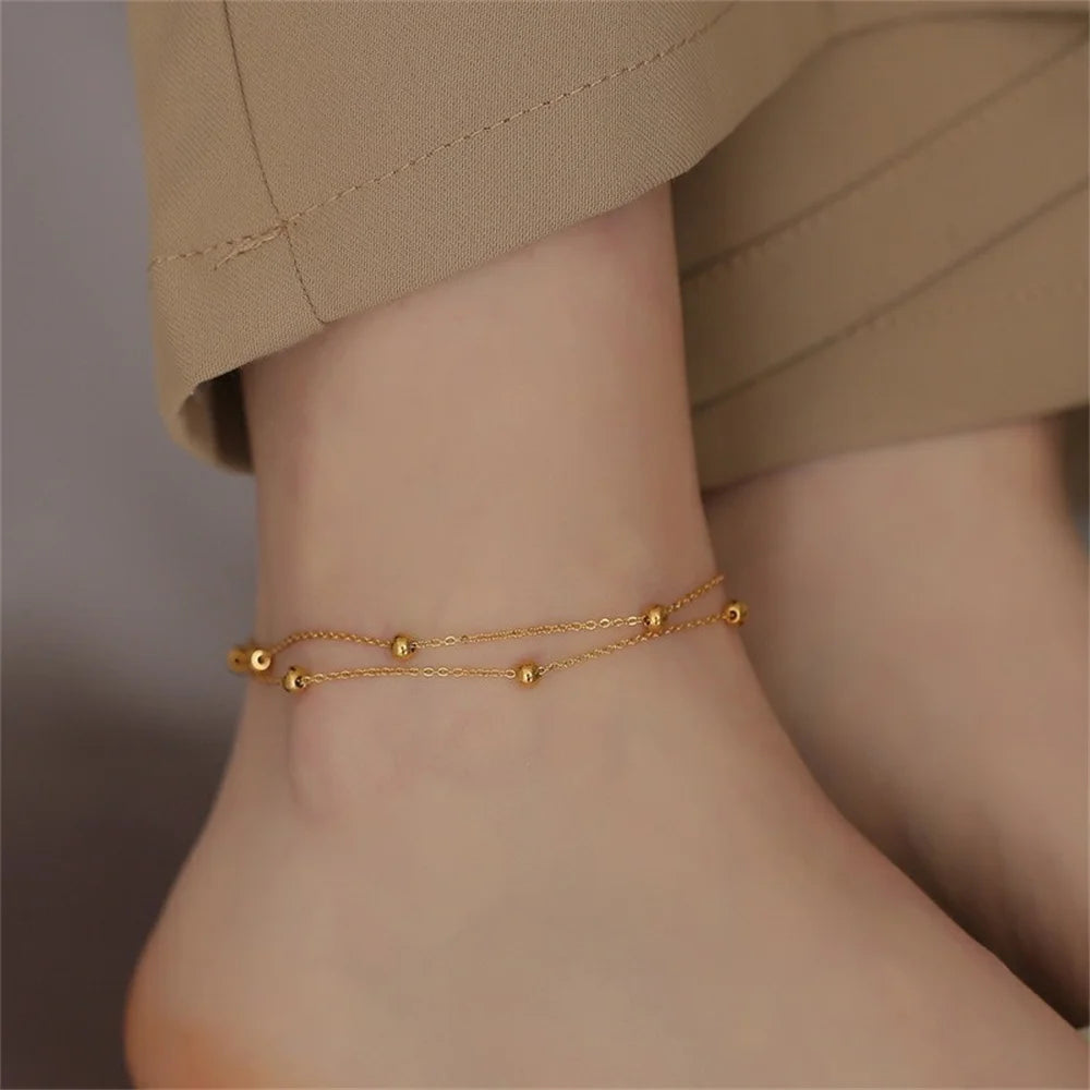 gold dangle anklet elegant ankle jewelry fashion photo | Oria Jewel