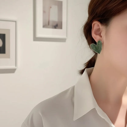 Sage Green Marble Heart Stud Earrings worn by model close-up side view | OriaJewel