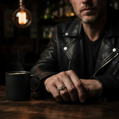 Macro product photo of the Silver Antler Wrap Ring on a black backdrop, showing the intertwined branch-like wrap texture and dimensional silver detailing | OriaJewel
