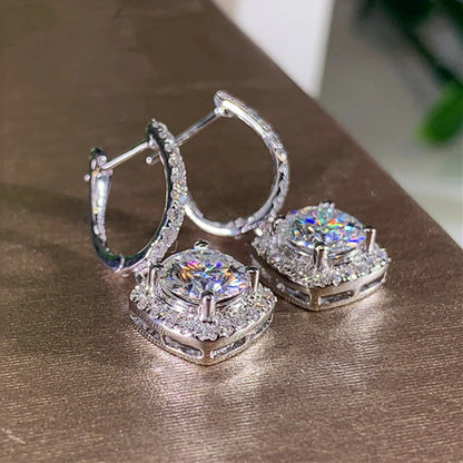 Silver Crystal Drop Huggie Earrings side-angle macro on satin surface | OriaJewel