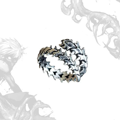 Silver Fishbone Ring product cutout on a clean white background, highlighting the detailed fishbone spine pattern, jagged link texture, and open wrap structure with a darkened antique silver tone | OriaJewel
