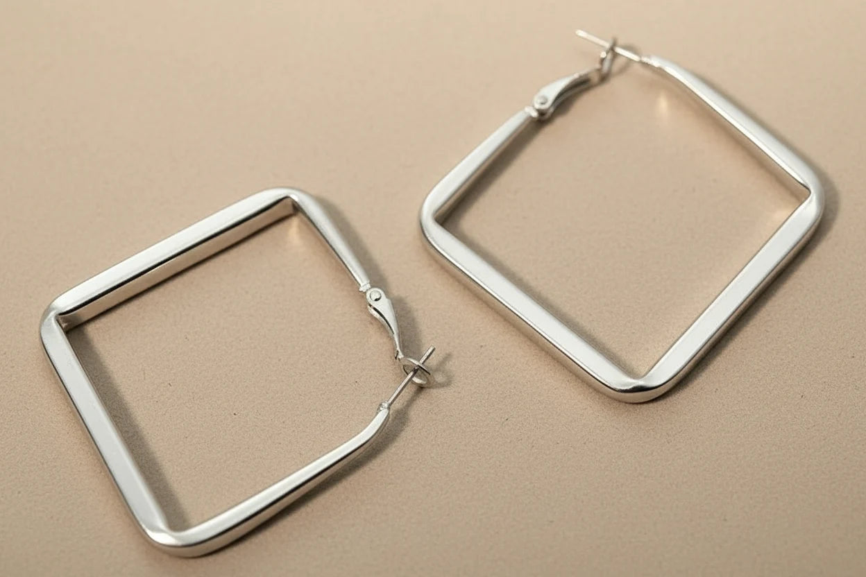 Silver Square Hoop Earrings close-up on beige background | OriaJewel