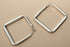 Silver Square Hoop Earrings close-up on beige background | OriaJewel