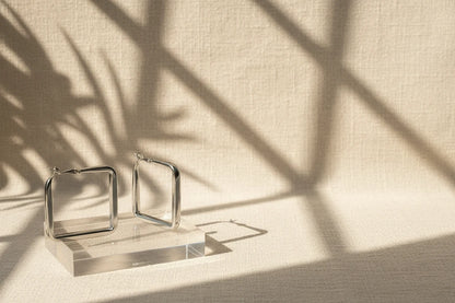 Silver Square Hoop Earrings on acrylic stand with shadow light | OriaJewel