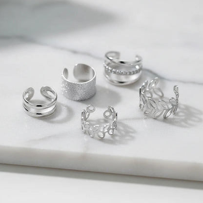 Silver 5-Piece Ear Cuff Set on marble surface close-up | OriaJewel