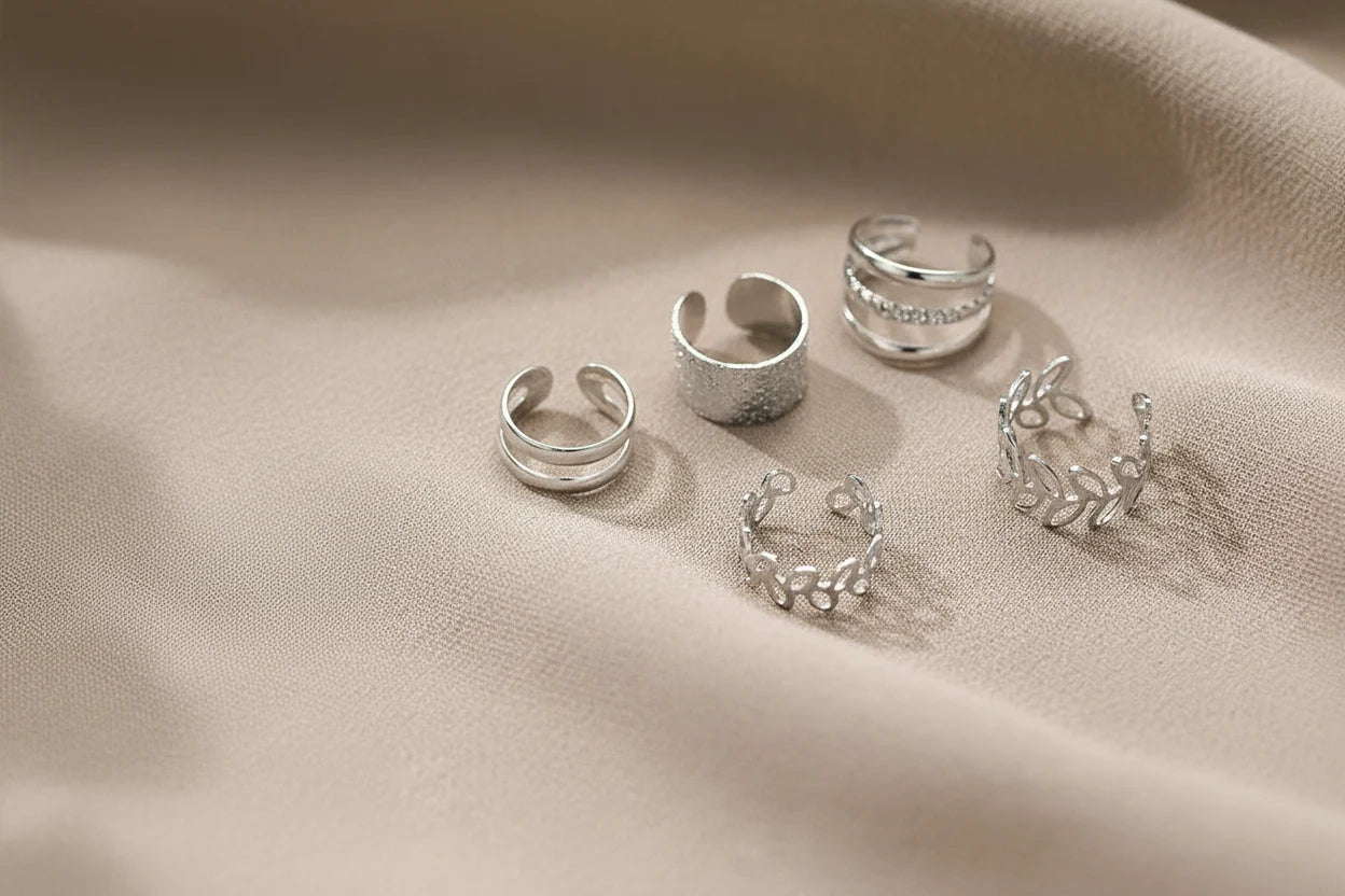 Silver 5-Piece Ear Cuff Set on soft fabric with natural light | OriaJewel