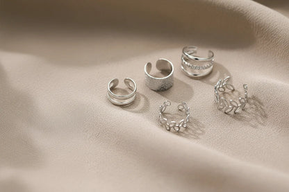 Silver 5-Piece Ear Cuff Set on soft fabric with natural light | OriaJewel
