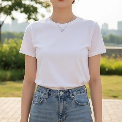 Casual look featuring Sterling Silver Heart Chain Necklace with white T-shirt and jeans — simple and modern style | Oria Jewel