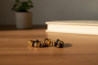 Tiger Eye Beaded Hoop Earrings on wooden table with book in background | OriaJewel
