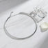Vintage Choker Necklace in silver placed beside perfume bottle on marble background for minimalist styling | Oria Jewel