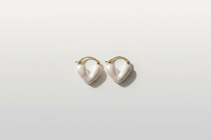 White Heart Huggie Hoop Earrings isolated on white background | OriaJewel