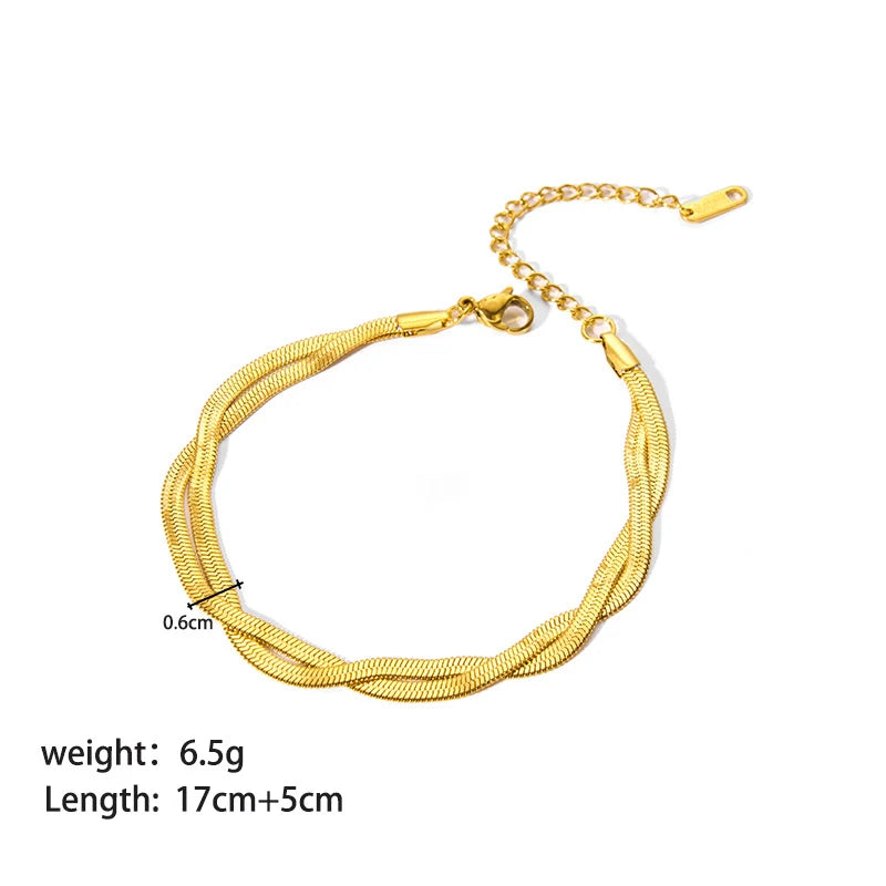 Studio product shot of a lightweight double chain gold bracelet with extender chain, lobster clasp, and size measurements on a clean white background | Oria Jewel
