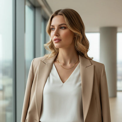 Woman wearing Flat Chain Choker with beige blazer and white blouse — sleek and professional style | Oria Jewel