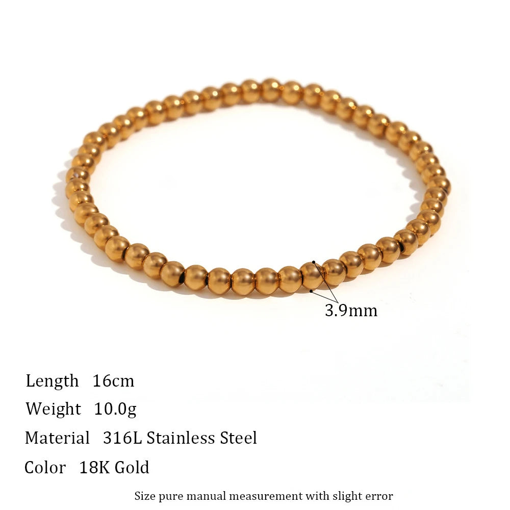 Delicate 3.9mm gold beaded stretch bracelet in 18K gold-plated 316L stainless steel shown on a white background with size and length details, perfect for everyday stacking style | Oria Jewel