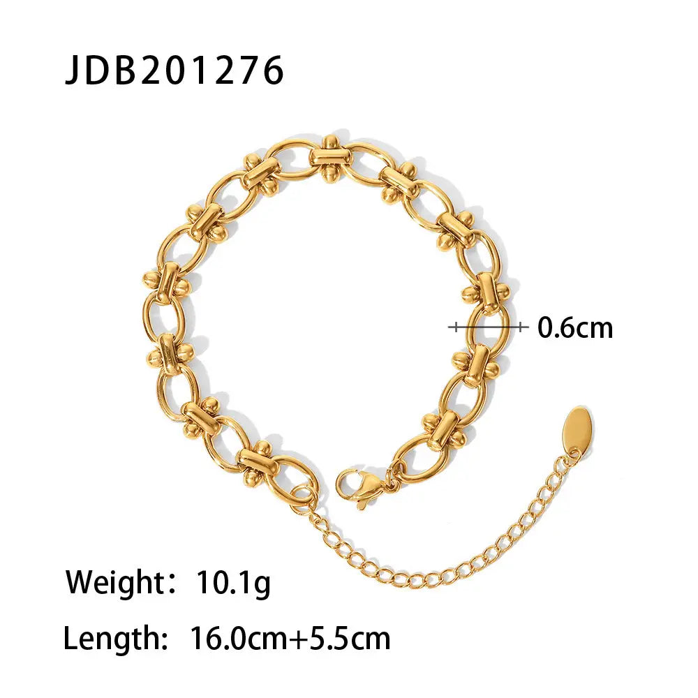 Close-up studio shot of a gold chain link bracelet laid flat in a circular shape with measurements and weight details displayed, highlighting its width and adjustable length | Oria Jewel