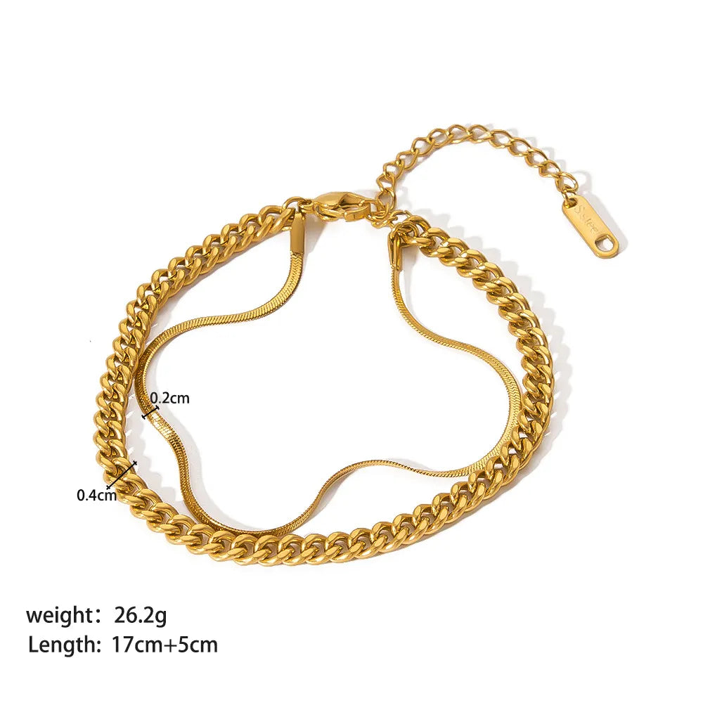Close-up product shot of adjustable gold double chain bracelet with extender, weight and length measurements clearly shown | Oria Jewel