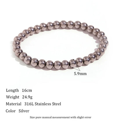 Product shot of a 5.9mm Silver Beaded Stretch Bracelet on a white background with printed specs for 16cm length, 316L stainless steel material and weight details, highlighting its bold rounded beads | Oria Jewel