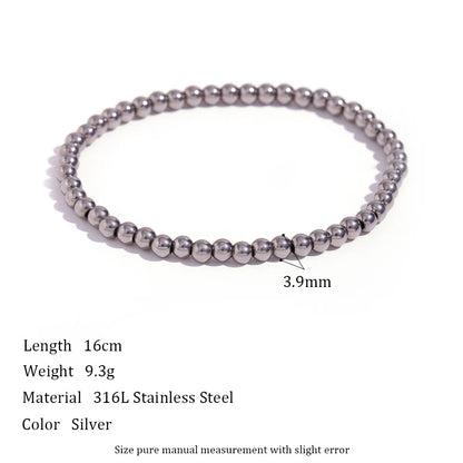 Medium 3.9mm Silver Beaded Stretch Bracelet lying flat on a white background with size and weight text, showing evenly spaced round beads for everyday stacking | Oria Jewel